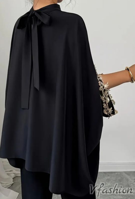 Широка блуза с бродерии