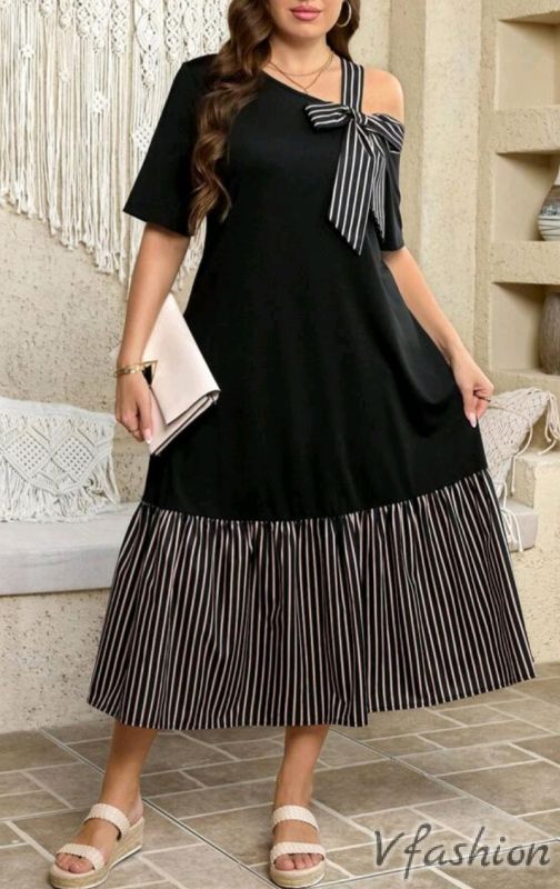 Рокля с акценти на райета